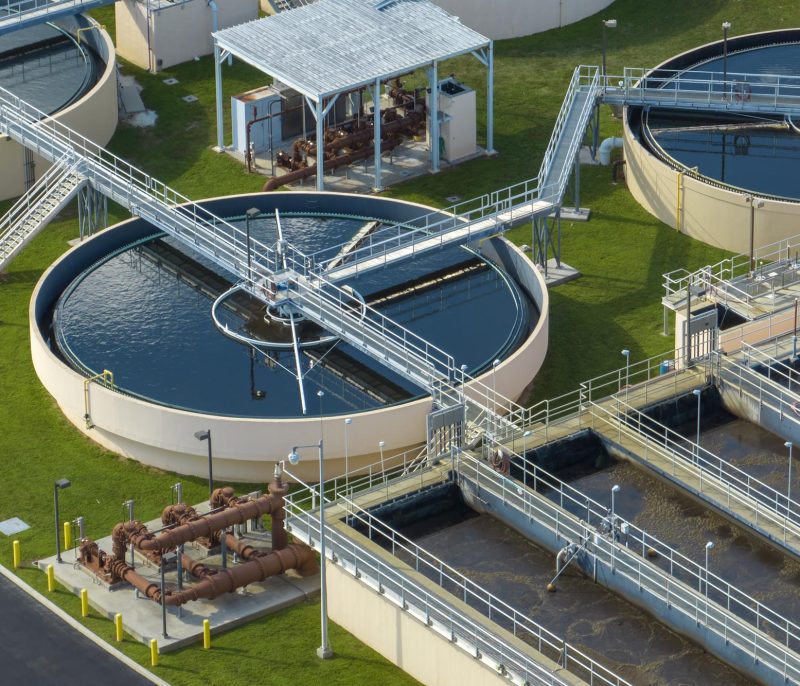 aerial-view-modern-water-cleaning-facility-urban-wastewater-treatment-plant-purification-process-removing-undesirable-chemicals-suspended-solids-gases-from-contaminated-liquid