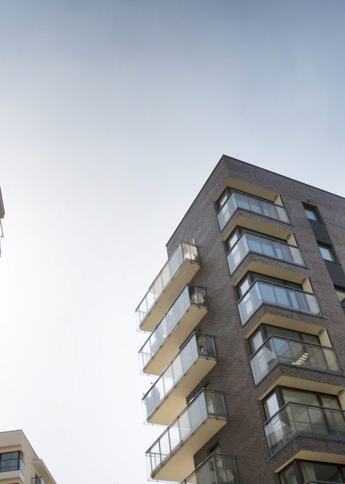residential-building-sky-background-facade-modern-housing-construction-with-balconies